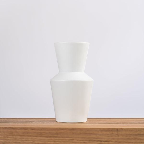 home decor modern ceramic vase on a wooden shelf