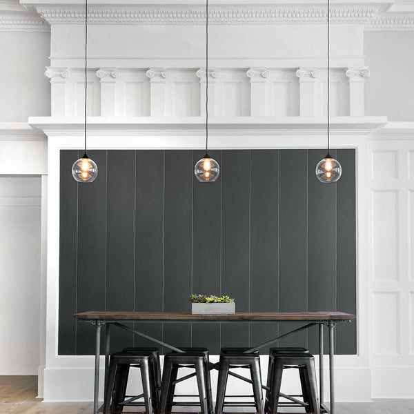 frankie glass pendant lights in a classic setting with industrial furniture