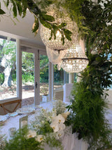 large palace empire chandelier pendant light in a wedding venue