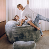 children jumping in sensory foam filled beanbag