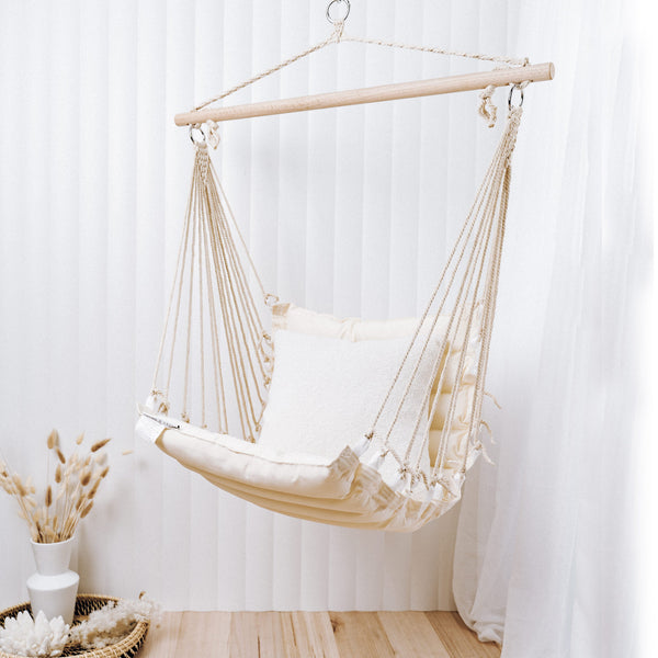 padded macrame rope hammock chair in living room