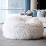 larger white lush beanbag in a modern apartment