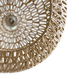 closeup of natural rope pendant light on a white background