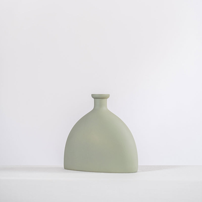 home decor modern ceramic vase on a white shelf