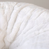 large white plush fur bean bag
