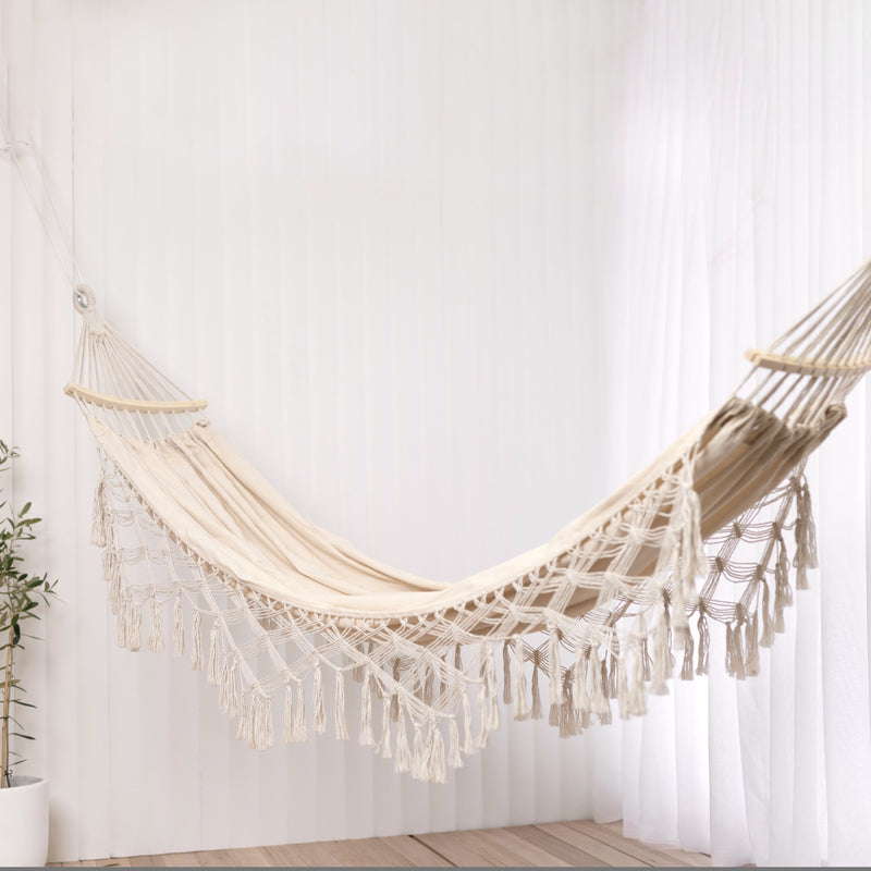 bohemian hammock with wood and fringe detail