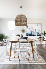 milford woven rattan pendant light in a classic dining room