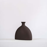 home decor modern ceramic vase on a white shelf