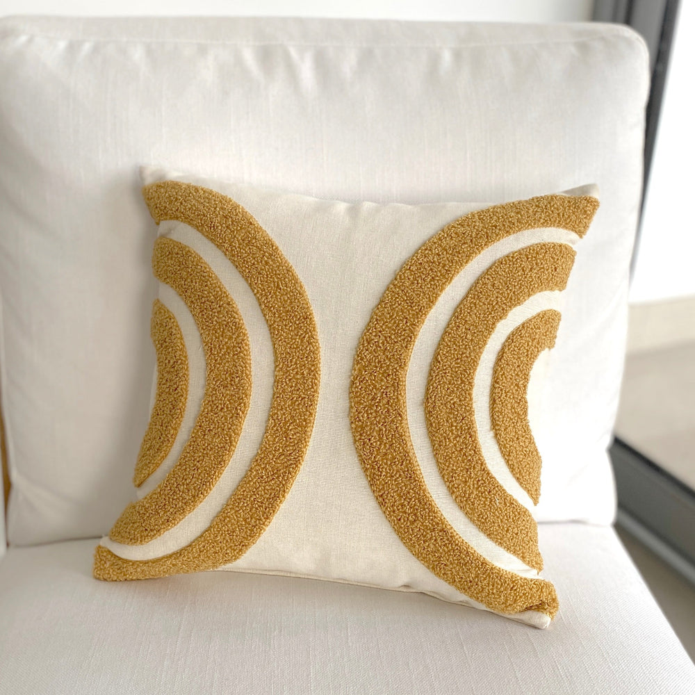 tufted cushion cover with natural and mustard  accents