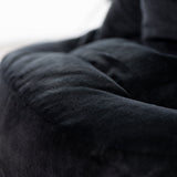 closeup of plush lounger in black