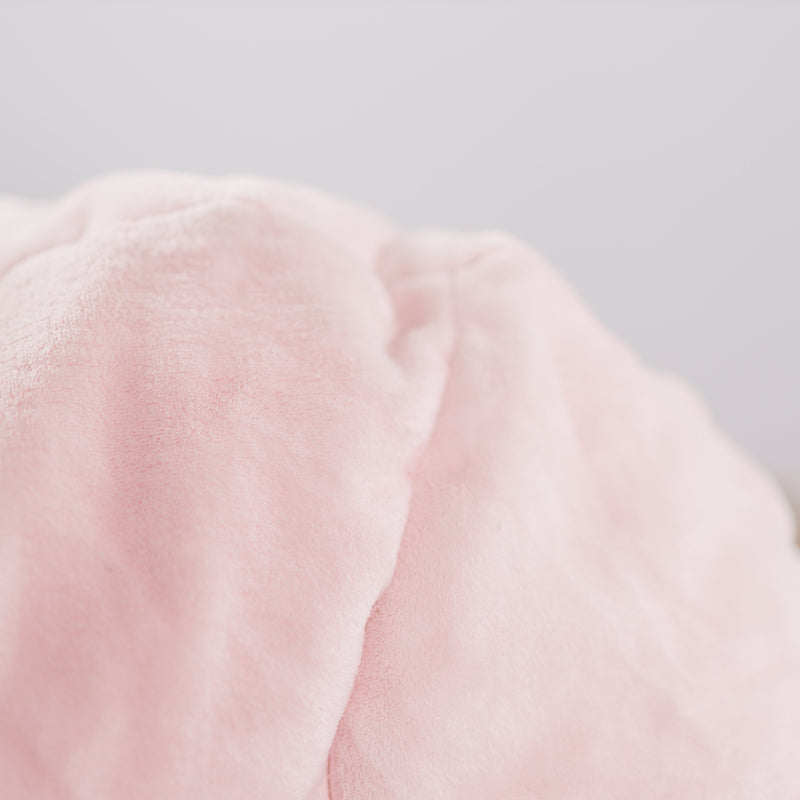 closeup of Soft pink lounger bean bag